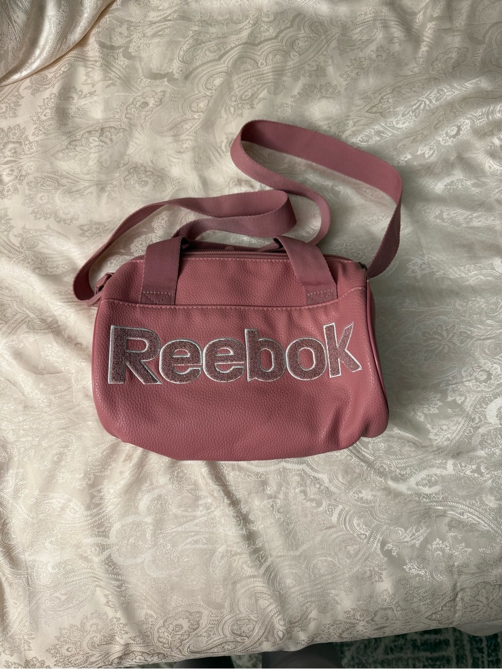 Reebok Dusty Rose Women's Mini Duffel Bag with Embossed Logo